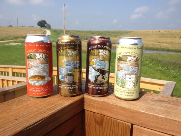 A line up of the four Piney River Beers that won awards at the US Beer Open Championship—Crankbait Cream Ale,  Black Walnut Wheat, McKinney Eddy Amber Ale and Hobby Farm Ale.