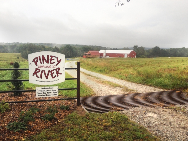 piney river farm with sign